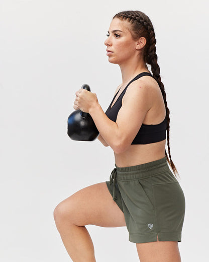 Dark moss green G5 Advance 4.5-inch knit shorts by Goal Five, showing the comfortable elastic waistband and soft fabric.