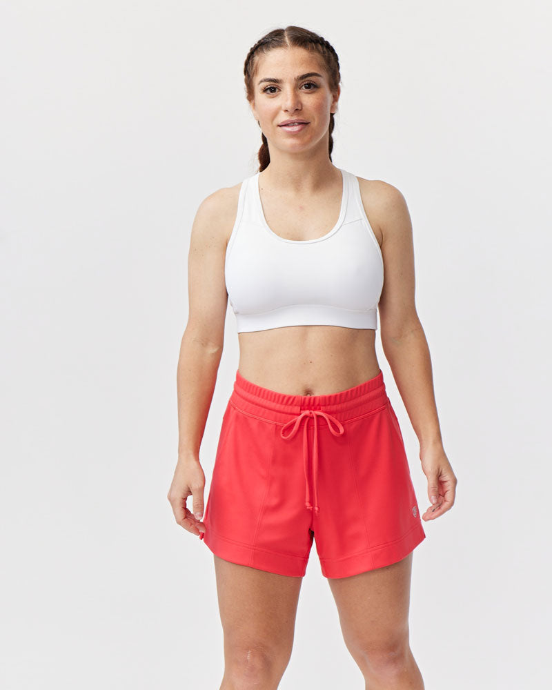Goal Five G5 Advance 4.5-inch knit shorts in hot coral, showing the soft fabric and casual fit for active wear.