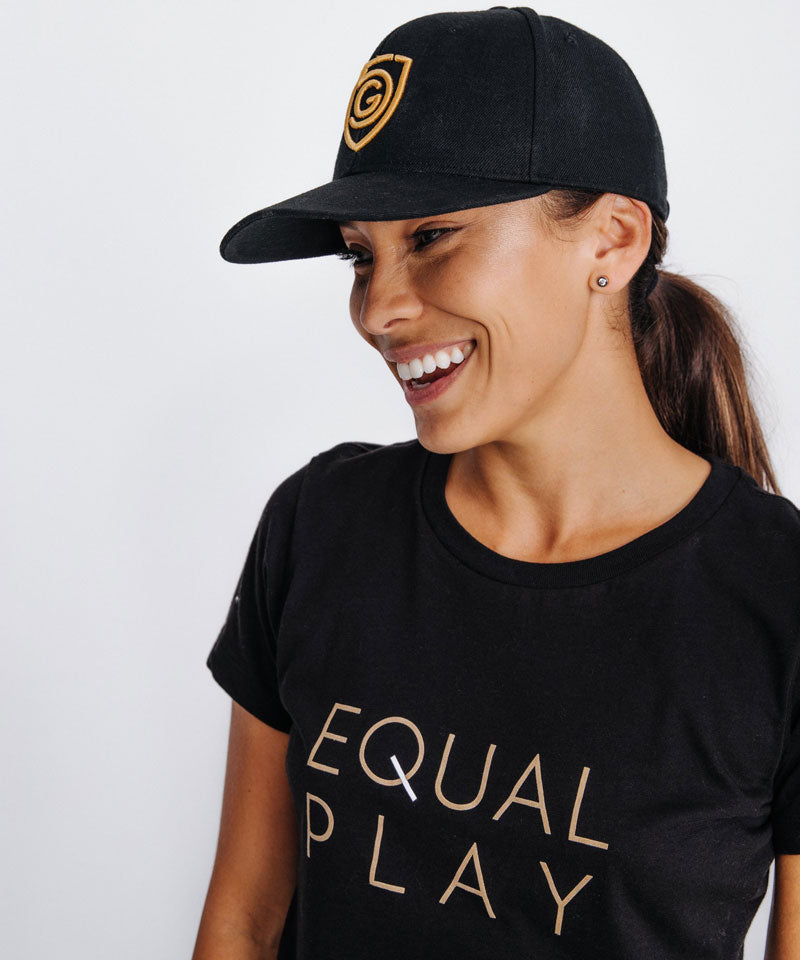 Goal Five G5 Flat Billed Snap Back Hat, lifestyle image showing black cap with curved brim and adjustable strap.