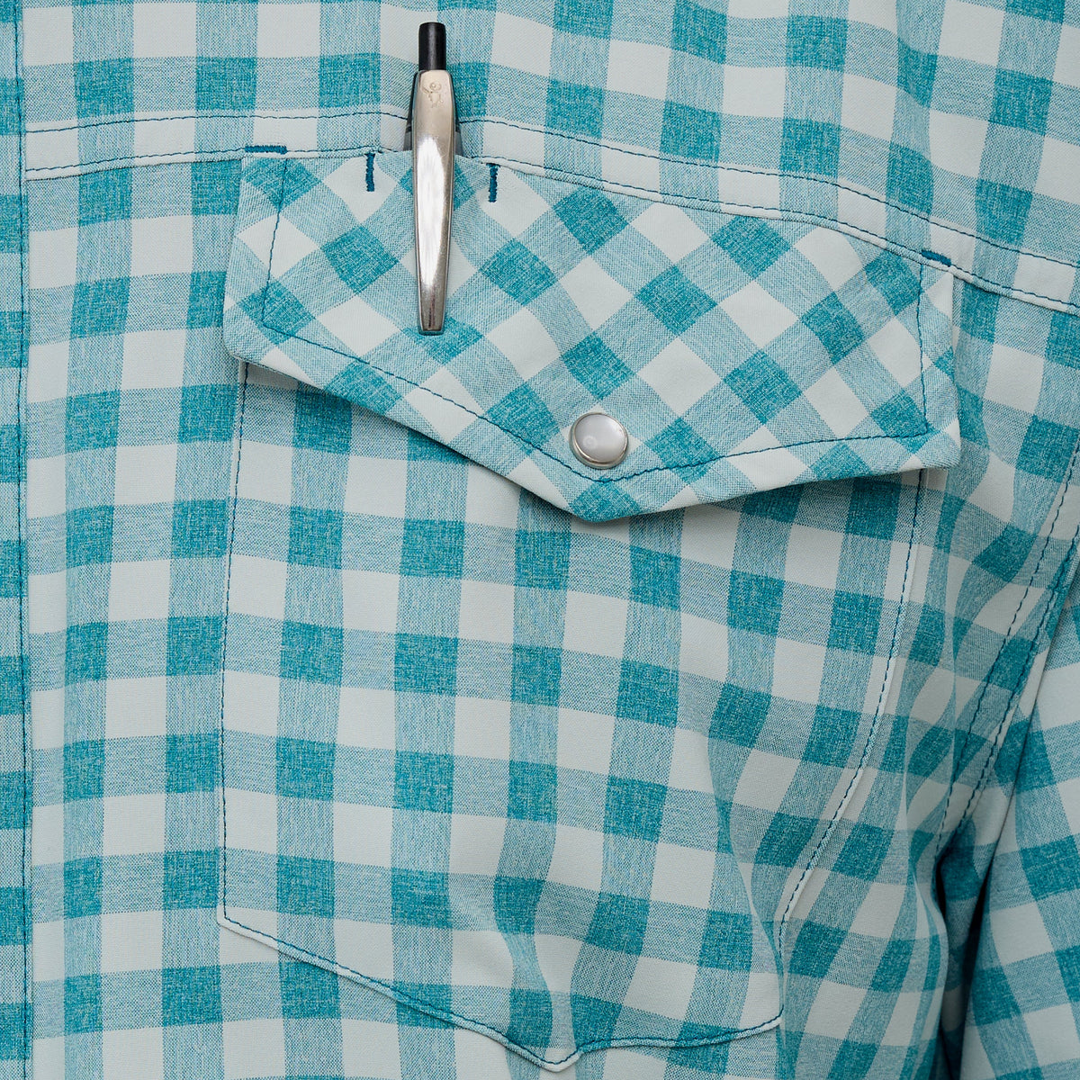 GameGuard Mahi Pearl Snap Shirt featuring classic pearl snap buttons and a stylish patterned design, ideal for casual wear.