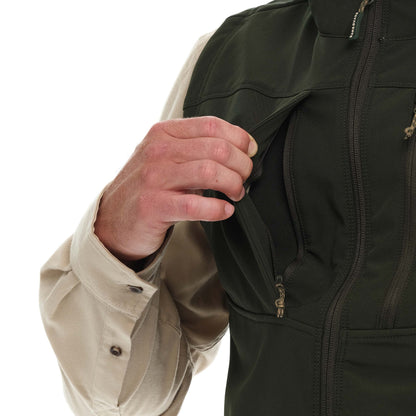 GameGuard Juniper Guía Grande™ vest shown on model, featuring durable outdoor fabric and adjustable fit for hunting or outdoor activities.