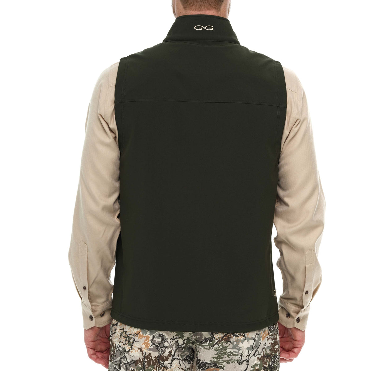 GameGuard Juniper Guía Grande™ vest shown on model, featuring durable outdoor vest with multiple pockets for outdoor activities.