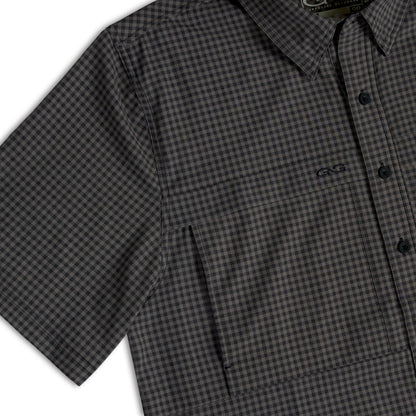 GunMetal TekCheck Shirt by GameGuard, featuring a modern checkered pattern in gunmetal color, displayed on a hanger.