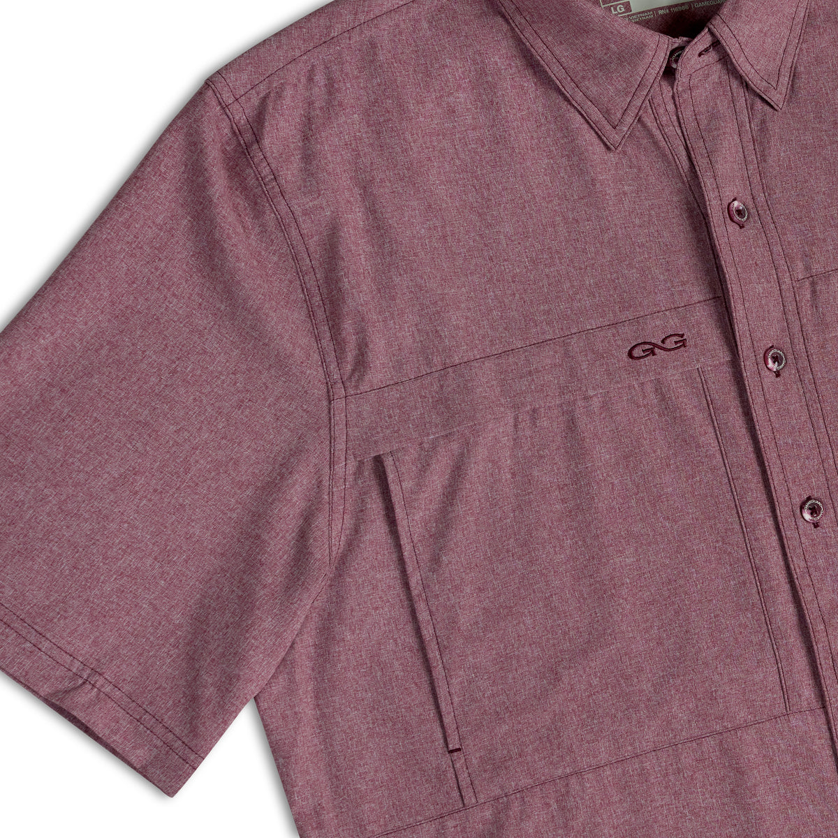 Maroon MicroTek shirt by GameGuard, close-up image showing fabric texture and collar detail.