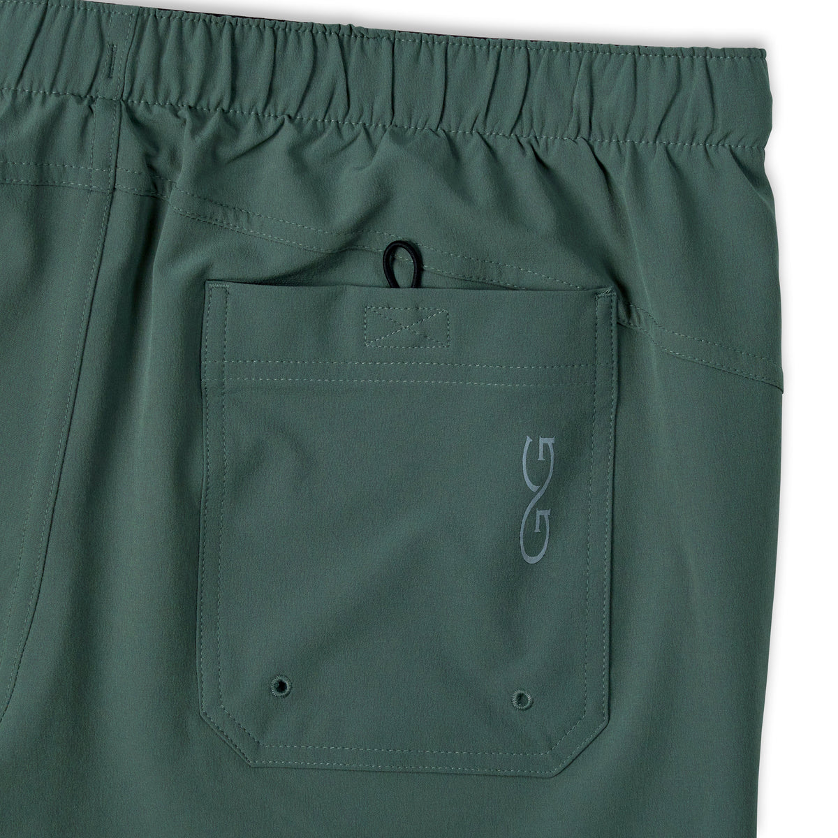 GameGuard Ironwood SeaDrift Pant, men's lightweight outdoor pants in olive green, with adjustable waistband and multiple pockets.