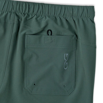 GameGuard Ironwood SeaDrift Pant, men's lightweight outdoor pants in olive green, with adjustable waistband and multiple pockets.