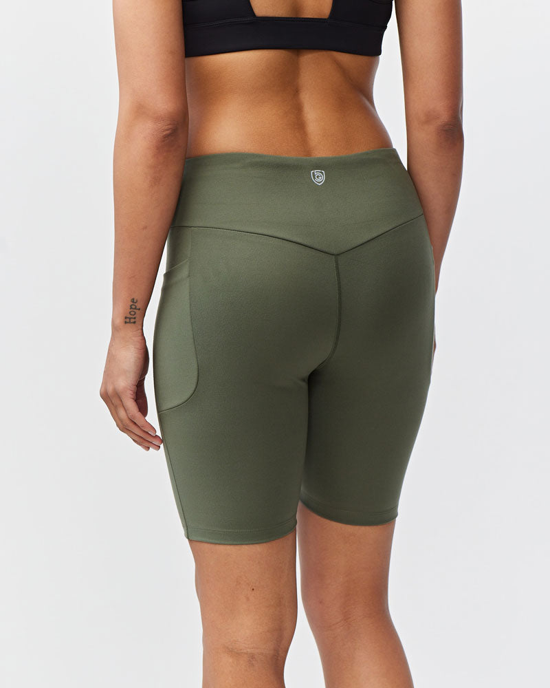 Goal Five Go Again Bike Short 8" training shorts in dark moss color, featuring a comfortable fit and athletic design for cycling.