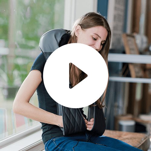 iReliev shiatsu neck and back massager with adjustable nodes and ergonomic design, shown in a gallery thumbnail image.