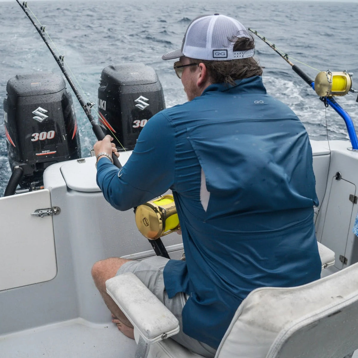 GameGuard Wahoo Original Long Sleeve Shirt shown in a natural outdoor setting, featuring durable fabric and vibrant design elements.