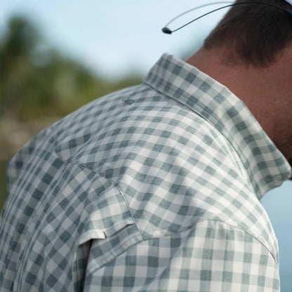 GameGuard Ironwood Pearl Snap Shirt showing the front with pearl snap buttons and a classic plaid pattern in earthy tones.