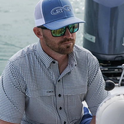 White TekCheck shirt by GameGuard featuring a classic checkered pattern and button-up design.
