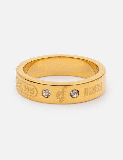 Elevated Faith gemstone logo ring featuring colorful gemstones set in a stylish gold band.