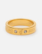 Elevated Faith gemstone logo ring featuring colorful gemstones set in a stylish gold band.