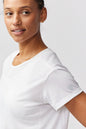 White Goal Five G5 Everyday Women's Performance Workout Top for training, with a sleek, comfortable fit and breathable fabric.
