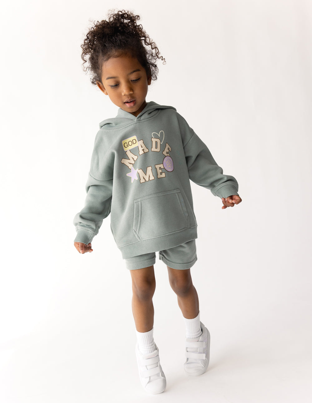 Elevated Faith God Made Me Kids Hoodie showing a colorful, comfortable hoodie for children with inspiring text and playful design.