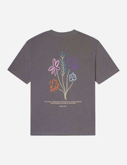 Unisex God's Still Working T-shirt by Elevated Faith featuring a bold graphic design on soft fabric.