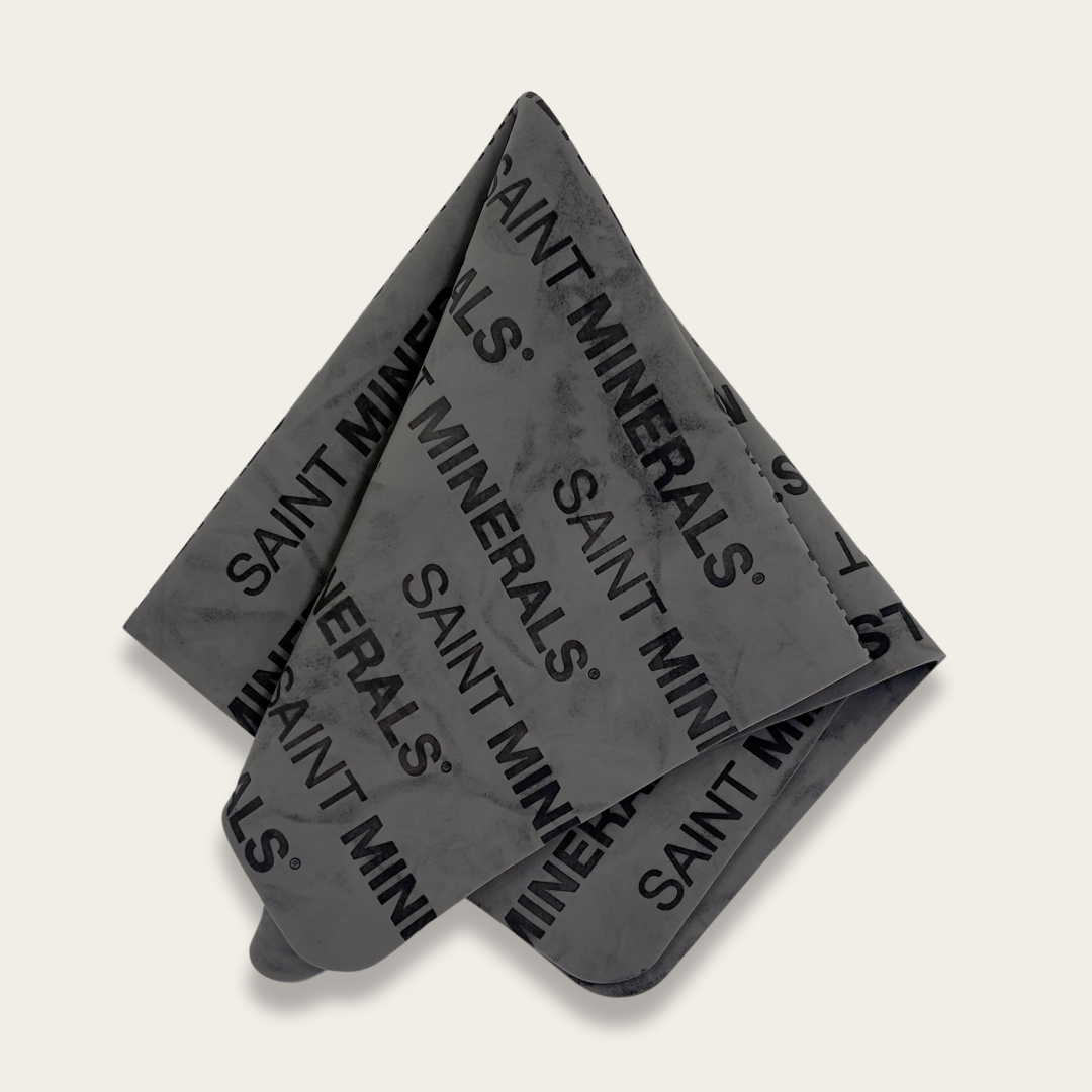 Grey Saint Minerals makeup remover shammy by Panoply Beauty, soft and reusable cloth for gentle makeup removal.