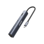 Anker 543 USB-C Hub 6-in-1 slim charging station with multiple ports, shown with connected devices on a sleek surface.