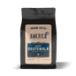 Ground Guatemala single origin coffee from America Supply Company LLC, showing rich, dark roasted beans in a bag.