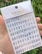 Black Old English font nail art stickers featuring alphabet letter transfers for gothic and gothic-inspired nail decoration.