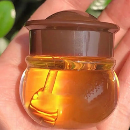 Blushimmer organic honey beeswax lip balm with hydrating, moisturizing formula for dry, chapped lips in a natural lip care product.