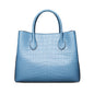 Luxurious Don John crocodile handbag for women, featuring elegant design and textured crocodile leather.