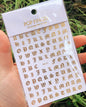 Black Old English font nail art stickers featuring alphabet letter transfers for gothic and gothic-inspired nail decoration.
