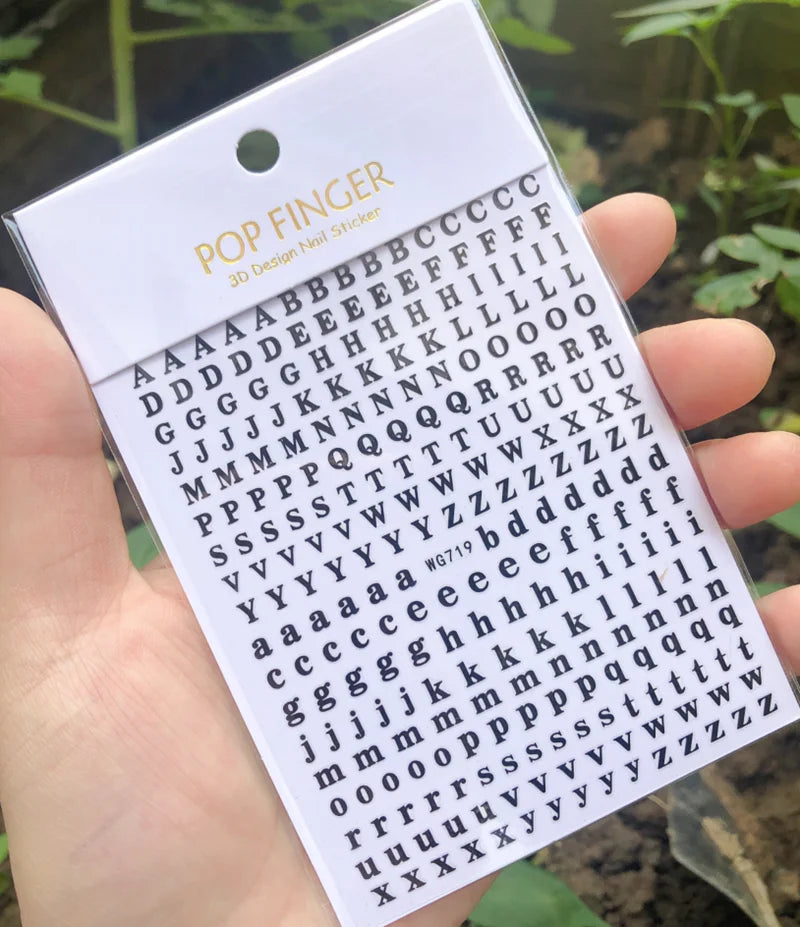 Black Old English font nail art stickers featuring goth-style alphabet letters for decorative nail decals by Blushimmer.