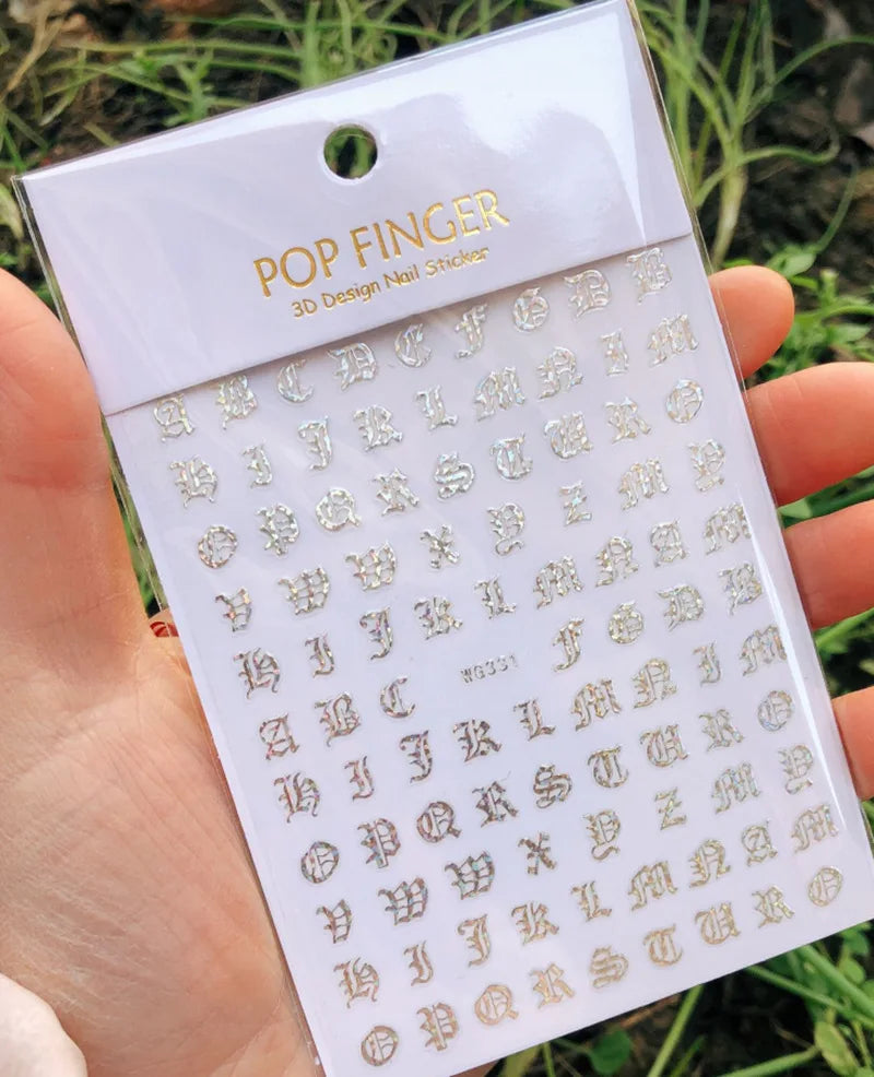Black Gothic Nail Art Stickers by Blushimmer featuring Old English alphabet letter transfers for decorative nail designs.