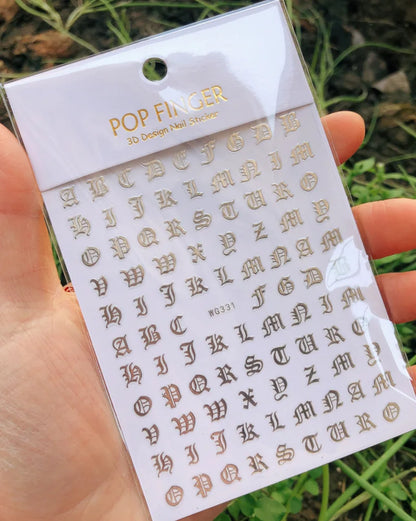 Black Old English font nail art stickers featuring alphabet letter transfers for gothic and gothic nail decoration by Blushimmer.