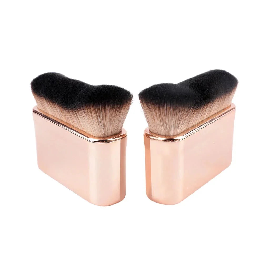 Blushimmer angled foundation makeup brush for liquid bronzer and powder application, portable cosmetic tool with wavy bristles.