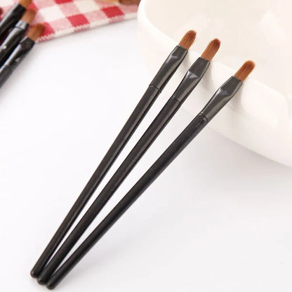 Set of 50 disposable lip brush gloss wands for professional makeup, featuring applicator tips for precise lip liner and gloss application.