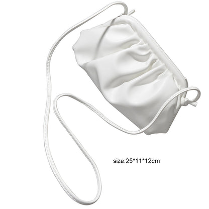 Black and white PU leather clutch handbag with shoulder strap, stylish women’s hand bag for casual or evening wear.