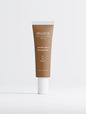 Peptide skin-perfecting foundation in 35 Tan Warm by BelleVie Cosmétiques, with warm undertone, showing smooth, even skin tone.