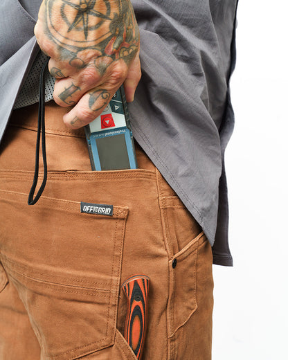 Off The Grid Surplus Hardened Double Knee Pant in tobacco color, durable work pants with reinforced double knees and rugged fabric.
