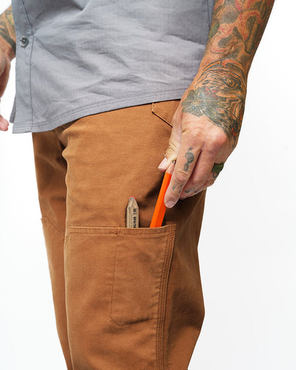 Off The Grid Surplus Hardened Double Knee Pants in tobacco color, durable work pants with reinforced knees and rugged design.