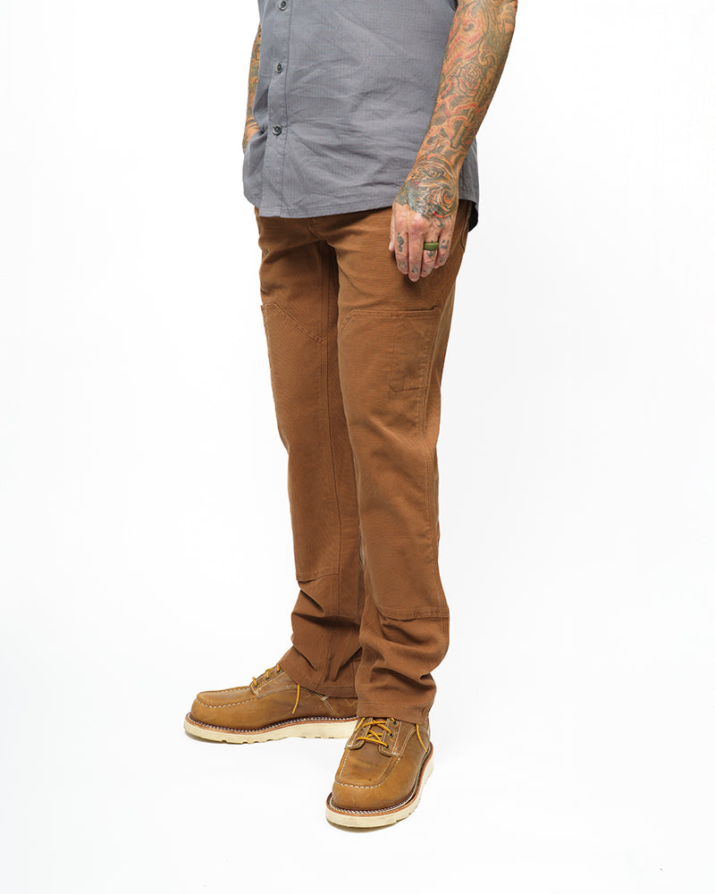 Off The Grid Surplus Hardened Double Knee Pant in tobacco color, durable work pants with reinforced knees and rugged design.