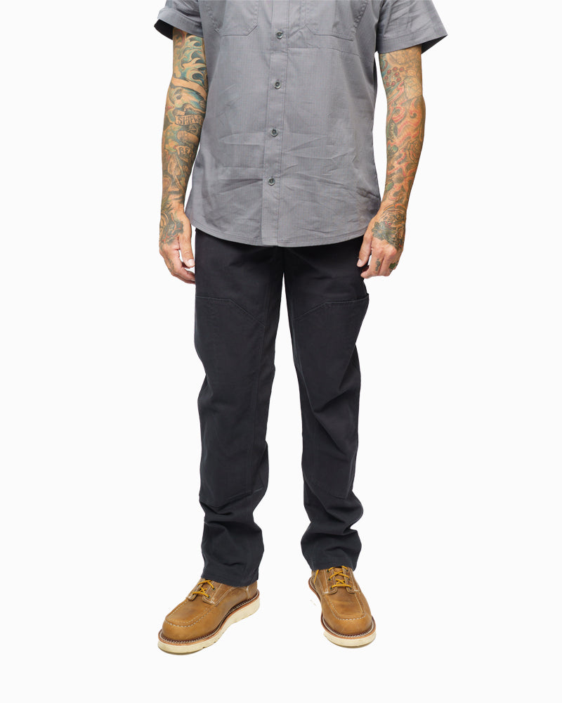 Black Hardened Double Knee Pants by Off The Grid Surplus, featuring reinforced knees and durable fabric for work or outdoor activities.