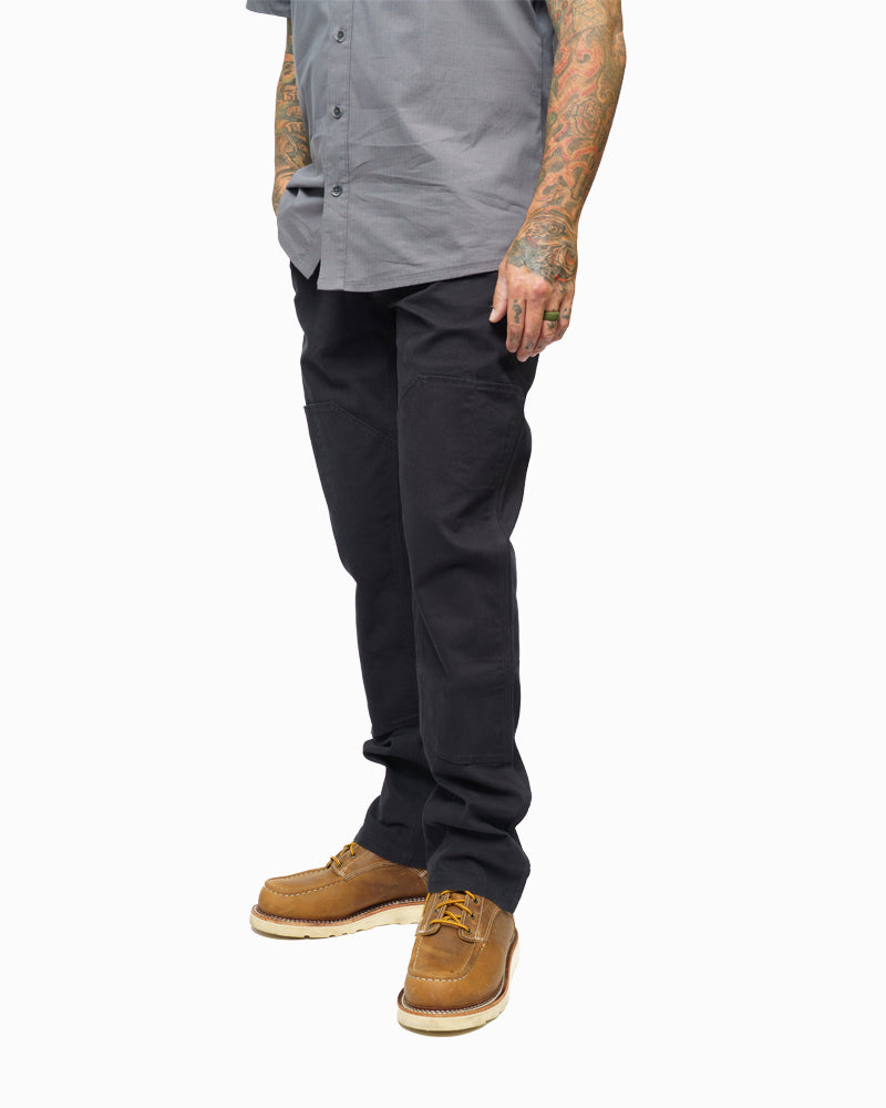 Black hardened double knee pants by Off The Grid Surplus, durable workwear with reinforced knees for tough environments.