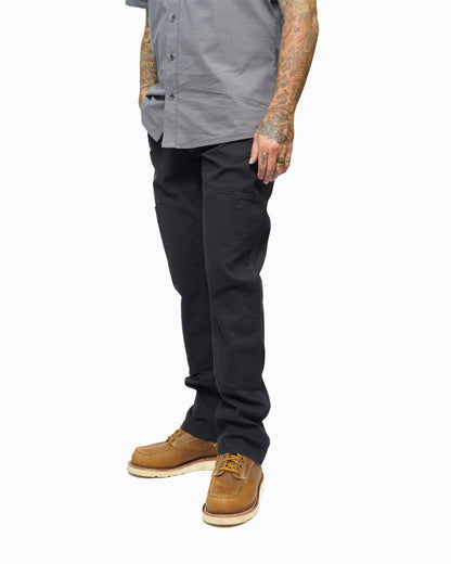 Black hardened double knee pants by Off The Grid Surplus, durable workwear with reinforced knees for tough environments.