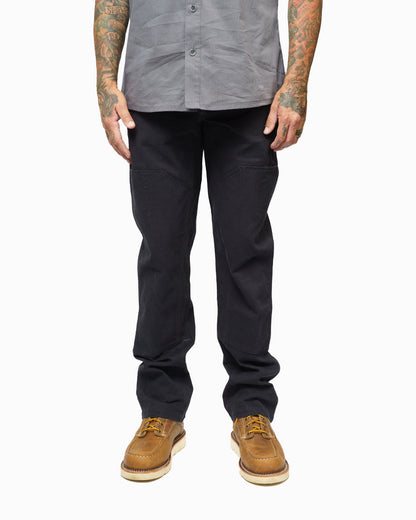 Black hardened double knee pants by Off The Grid Surplus, durable workwear with reinforced knees and rugged fabric.