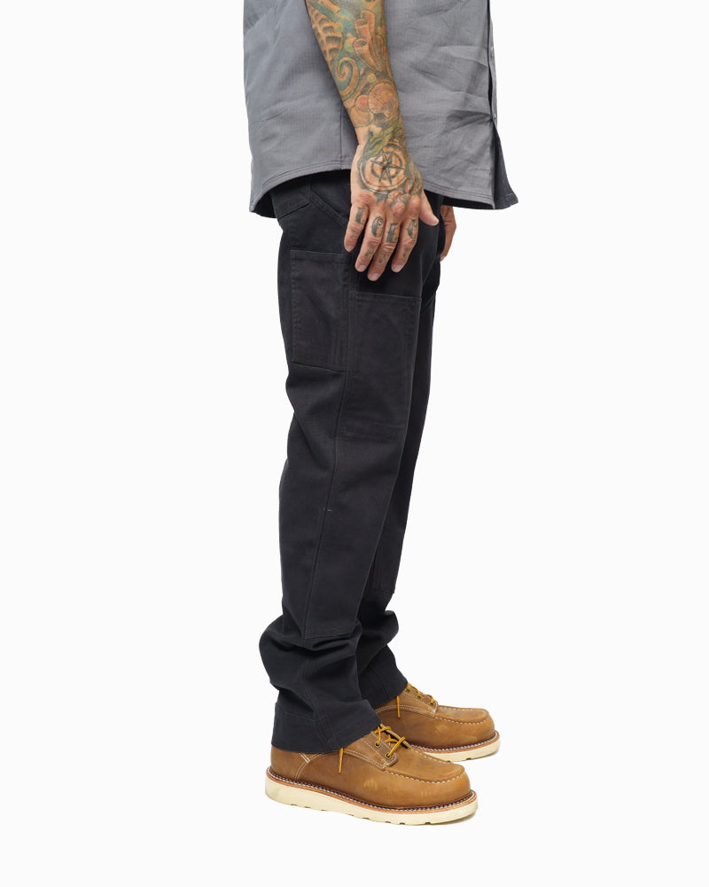 Black hardened double knee pants by Off The Grid Surplus, showing durable fabric and reinforced knee design.