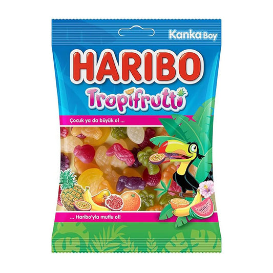 Haribo Tropifrutti 80g package showing colorful fruit-flavored gummy candies in a clear bag.