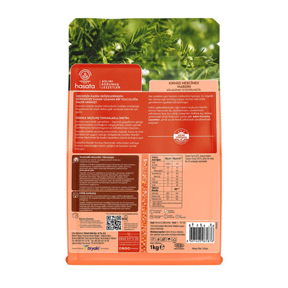 S101 Hasata Red Lentils in a 1kg bag, showcasing vibrant red lentils ready for cooking in a natural setting.