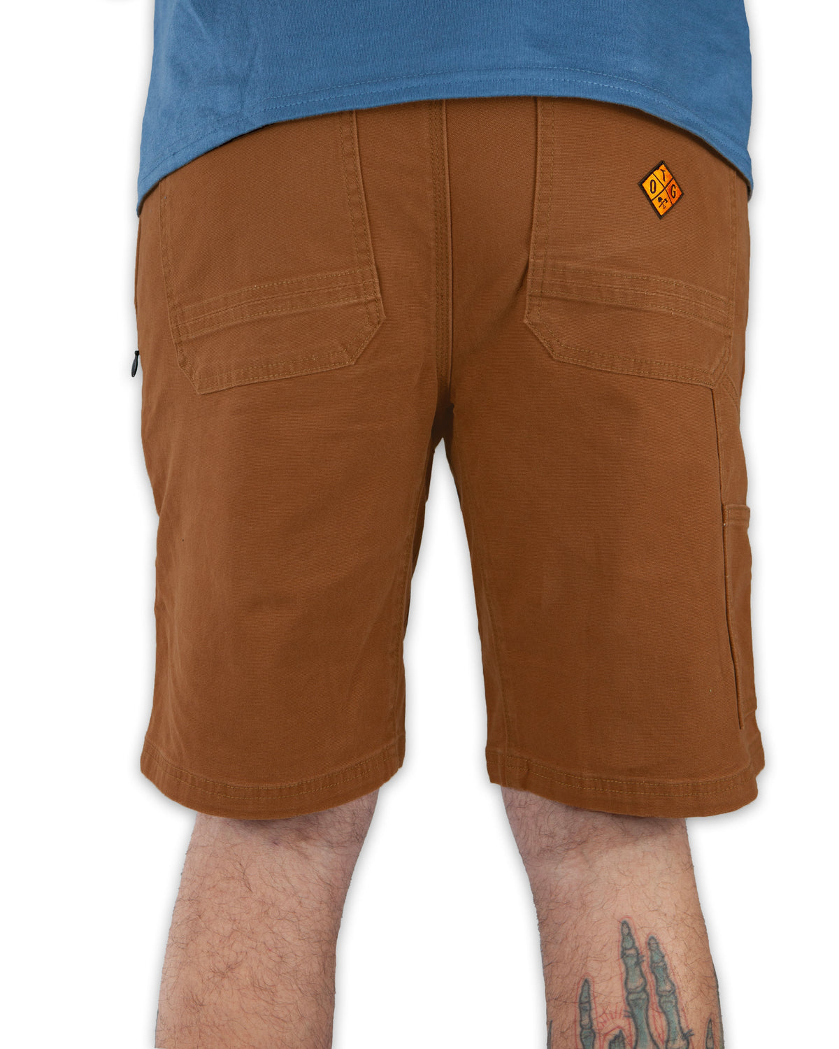 Off The Grid Surplus Havok Shorts 10-inch in tobacco color, featuring durable fabric and casual fit, shown in the image.