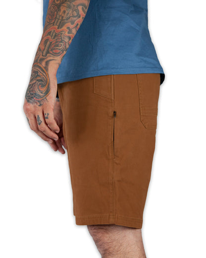 Off The Grid Surplus Havok Shorts 10-inch in tobacco color, featuring durable fabric and casual fit, displayed on a hanger.