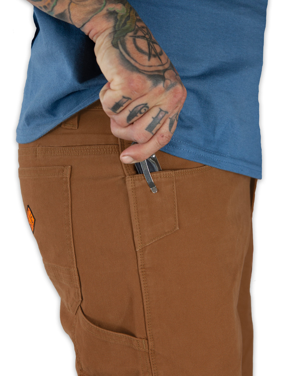 Off The Grid Surplus Havok Shorts 10-inch in tobacco color, featuring durable fabric and casual fit, displayed on a plain background.