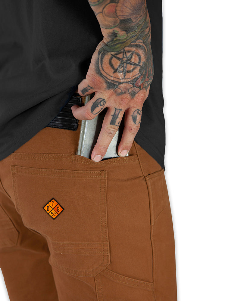Off The Grid Surplus Havok Shorts 12-inch in tobacco color, casual shorts with a relaxed fit and durable fabric.