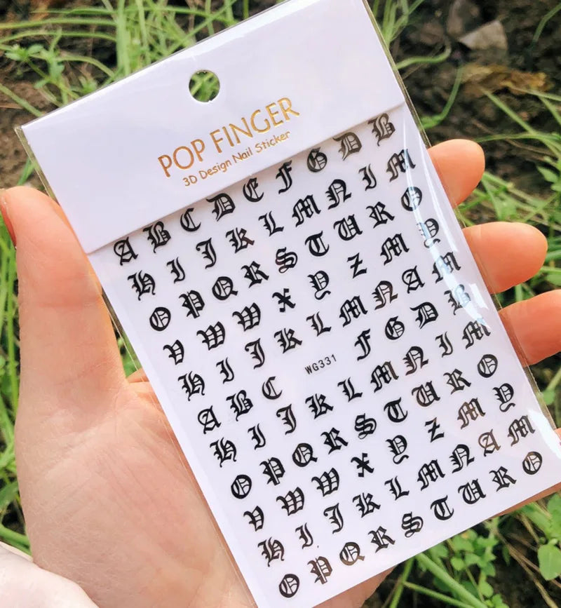 Black Gothic Nail Art Stickers from Blushimmer featuring Old English font letter transfers for decorative nail design.