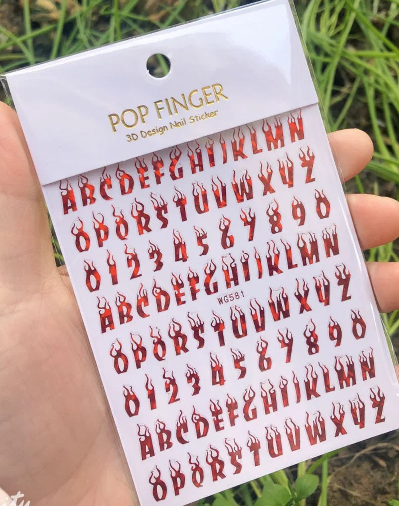 Black Old English font nail art stickers featuring alphabet letter transfers for gothic and gothic nail decoration by Blushimmer.